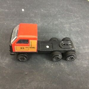 Toy Tonka Truck with Red and Black Design